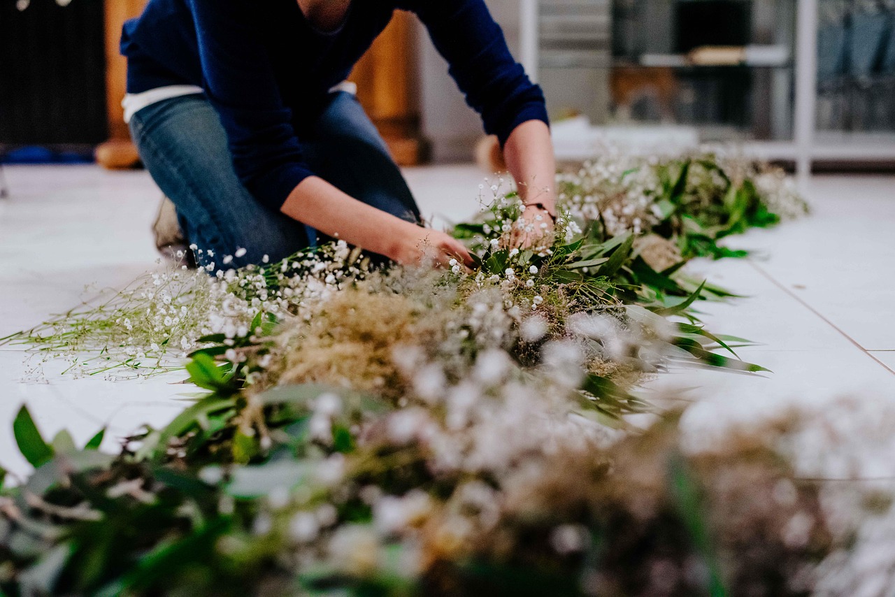 florist arranging wedding flowers